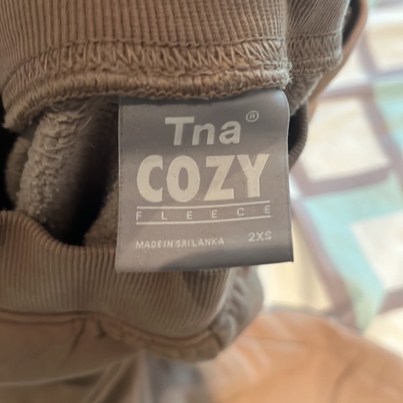 TNA cozy fleece sweatpants. Size 2xs. Light brown. No stains or damages. - Picture 3 of 3